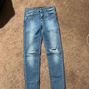 Girls skinny jeans with ripped knees size small